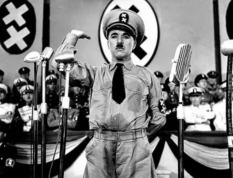 lin-em-cena-de-o-grande-ditador-de-1940-sua-satira-ao-nazista-adolf-hitler-1391199006090_615x470.jpg