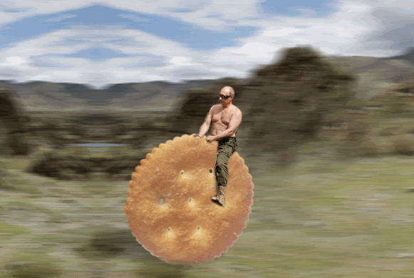 Vladimir-Putin-Rolling-On-The-Ritz-Crackers1.gif