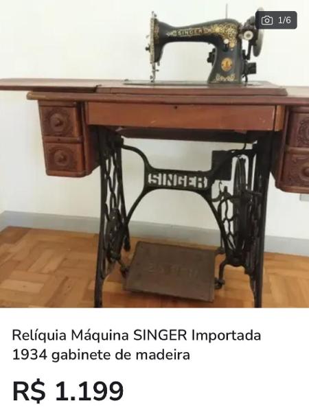 Máquina Singer, de 1934, tem até mesa de madeira